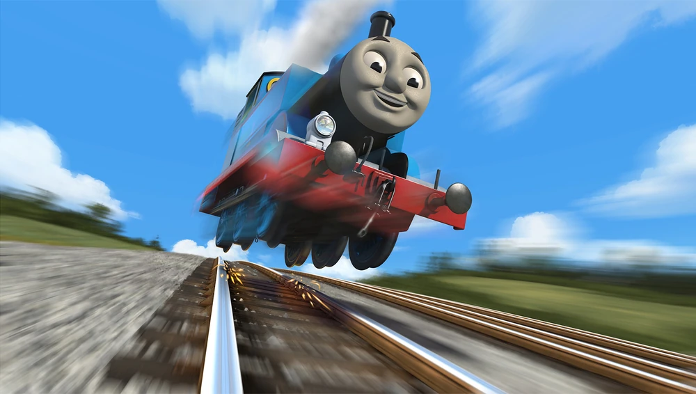 Thomas rijdt op volle snelheid over de rails van Sodor